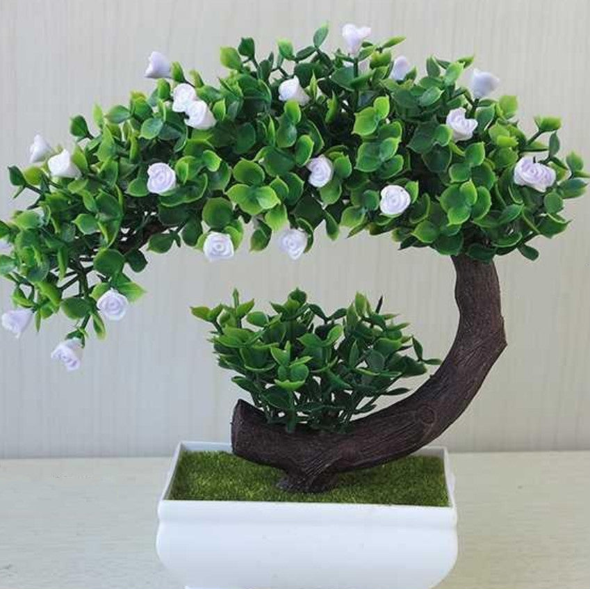 Plastic bonsai with fake flowers